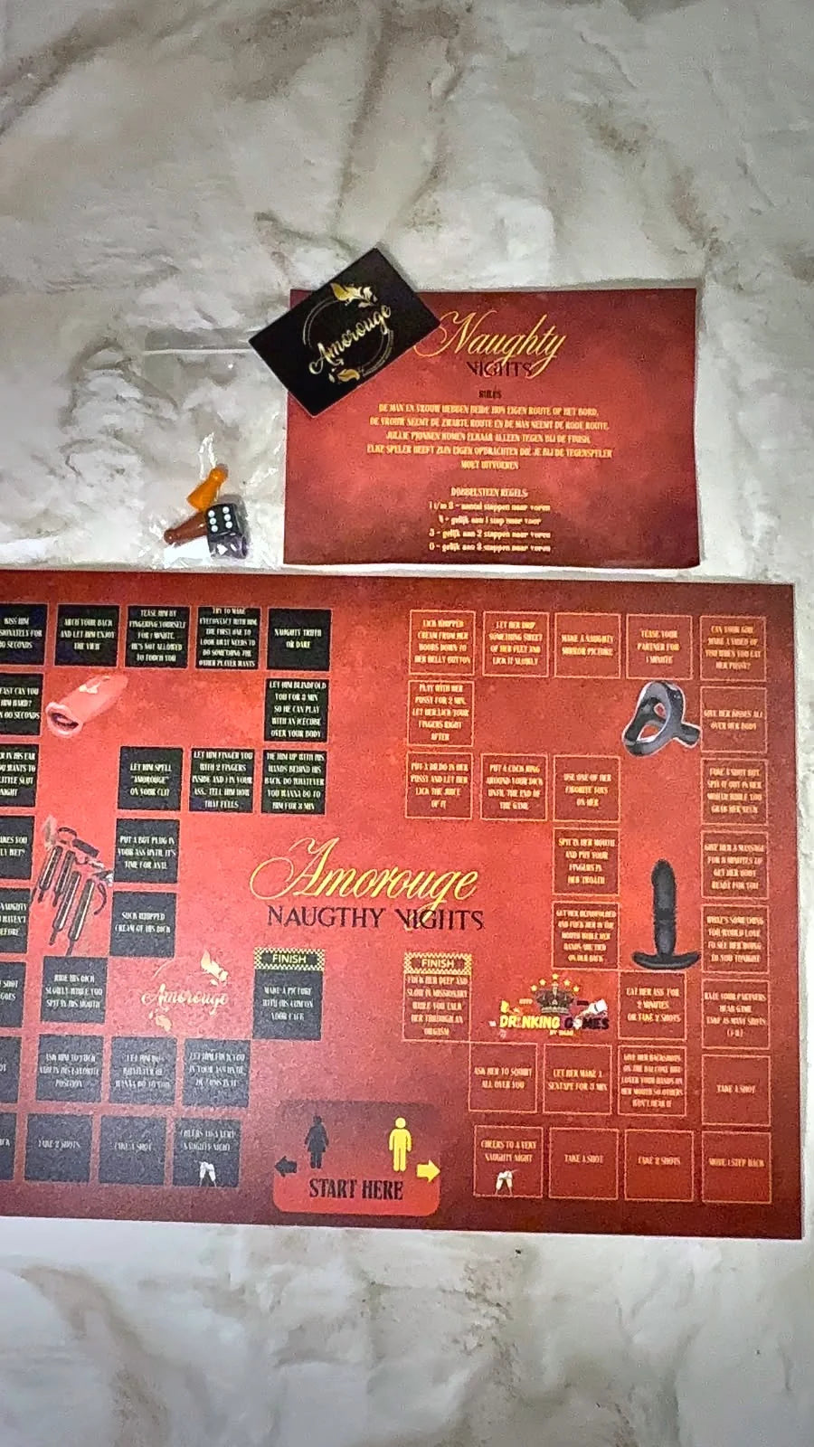 Amorouge The Naughty Game: speelbord, spelregelkaart, pionnen en dobbelsteen